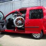 Der LADEBOY S mit Schwenkmodul im VW Caddy mit 4 Sitzen.